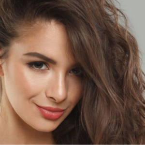 Woman with a fresh, stylish haircut – professional haircut services at Vibes Salon Siliguri.
